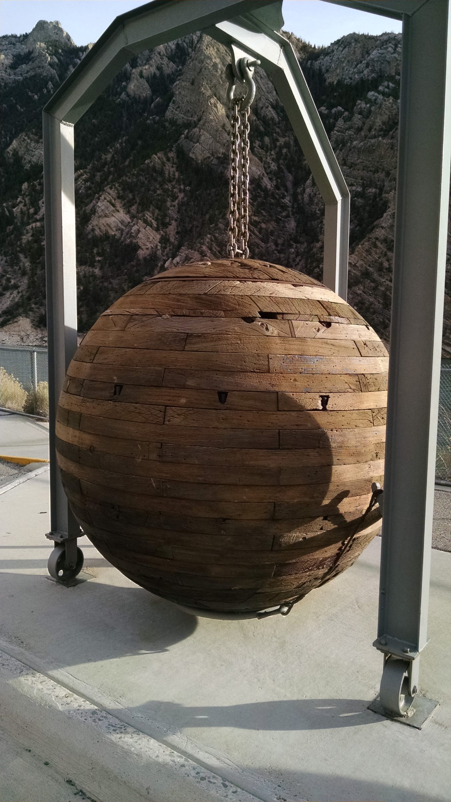This is an old wooden ball plug that was historically used to plug the 42" outlet hole in the dam.